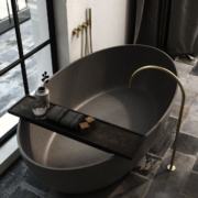 COCOON John Pawson gray bathtub with gold faucet