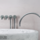 John Pawson fixture in silver over COCOON soaking tub