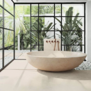modern luxury bathroom design, beige COCOON tub with outdoor view
